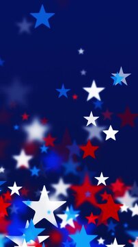 Confetti stars in America's Independence Day colors red white and blue. USA backgrounds with star shapes for American celebrations 4th of July, Memorial Day Veteran's Day or patriotic US holidays.