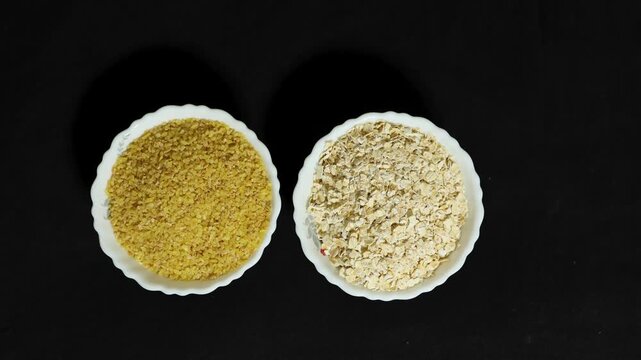 healthy breakfast grains featuring bulgur wheat and oat flakes in white bowls