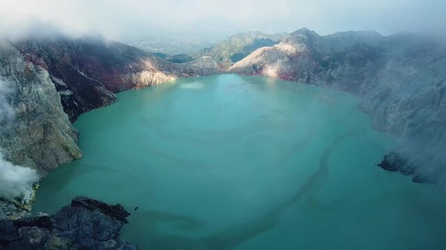 Breathtaking aerial view of ijen volcano crater lake in indonesia
