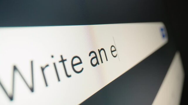 Motorized moving shot of using artificial intelligence to write an email with a text prompt