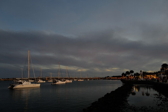 Low tide on the river just outside St. Augustine in Florida with numeroud sail boats and catamarans