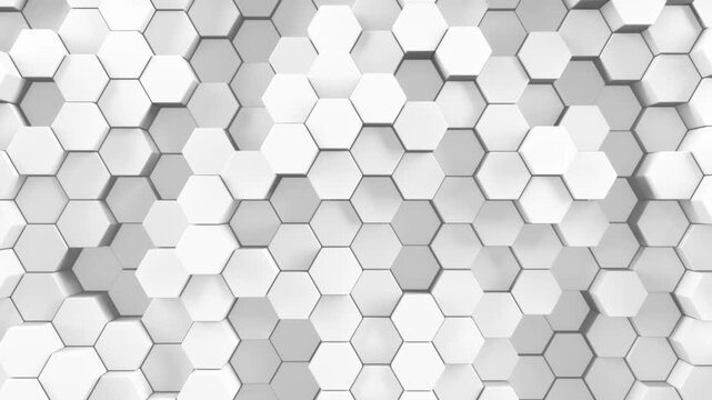 White background of patterned hexagons. Smooth movement of 3d rendered hex shapes creating a visual of a sleek elegant motion for futuristic scientific or technical backgrounds. 3d render loop.