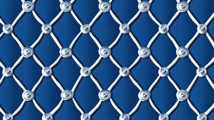 Naklejka premium Deep blue upholstery fabric featuring elegant diamond stitching pattern with silver button tufting details for luxury interior design.
