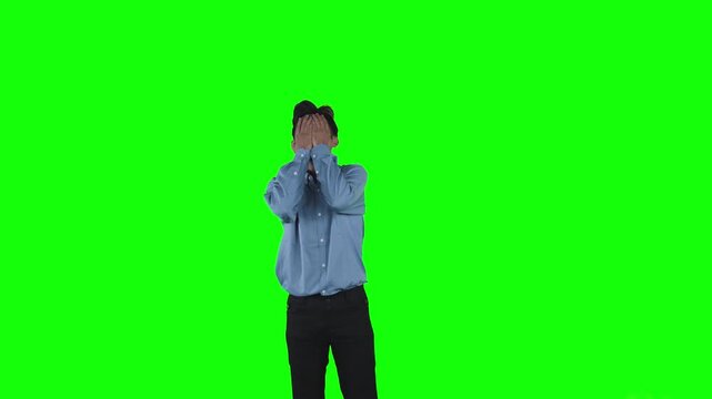 Frustrated Young Businessman Reacting to Loss, Stress, or Failure on Green Screen Background