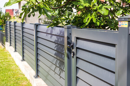 Modern fence with aluminum or metal shutter
