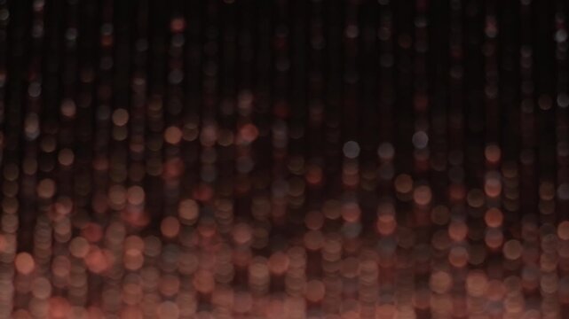 Sparkle glitter reflection. Color twinkle blur. Light defocused circles stripes glow fade flicker. Abstract bokeh dots luminosity background.