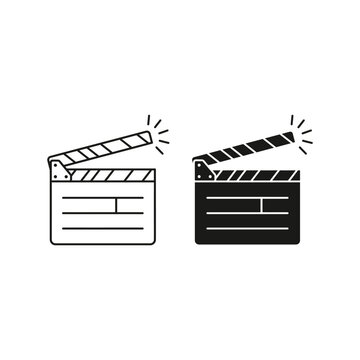 Movie clapper boards in action with sparks flying around them indoors
