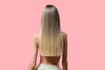 Naklejka premium Long straight blonde hair with dark roots, healthy hair care and beauty treatment, hair extensions and styling
