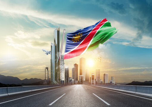 Namibia flag waving with modern and developed landscape. Namibia national flag for independence day.
