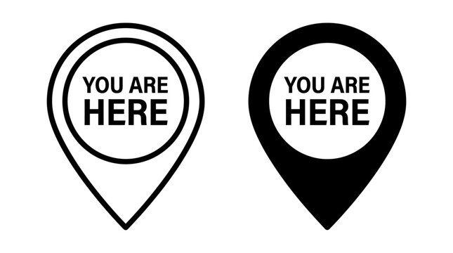 Two location pins with bold text &lsquo;YOU ARE HERE,&rsquo; contrasting outline and solid styles, symbolizing navigation, clarity, and modern design.