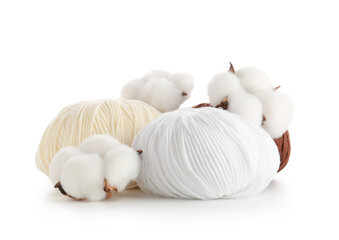 Natural cotton bolls and yarn balls for textile production and sustainable fabric crafting, the...