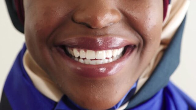 Face, teeth and muslim black woman with dental care, oral wellness or smile for orthodontics. Happy, hijab and person with clean mouth for gum hygiene, veneers and dentistry with health in studio