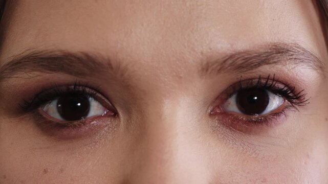 Optical, face or eyes with examination, closeup and glaucoma screening in vision care. Portrait, blink or person with optometry function, eyesight assessment or visual tracking for ocular wellness.
