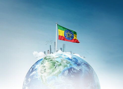 Ethiopia flag waving on globe with skyline. A concept showing prosper. Flag proudly waving on globe.  Ethiopia national flag for independence day.
