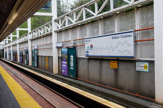 Stadium-Chinatown SkyTrain platform with FIFA World Cup banners