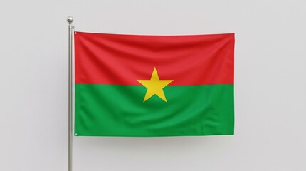 Obraz premium Burkina Faso flag with red and green stripes and central yellow star—symbolizing unity, revolution, resilience, and national identity rooted in cultural heritage and pride.