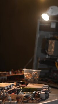 Workstation With Exposed Electronic Components. Open Computer Case Revealing Circuit Boards And Components. Media
