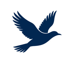 Obraz premium Silhouette of a dark blue bird in flight.