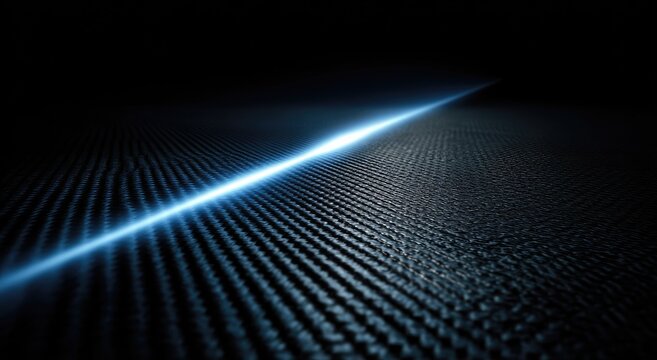 Futuristic carbon fiber surface with a bright blue light beam