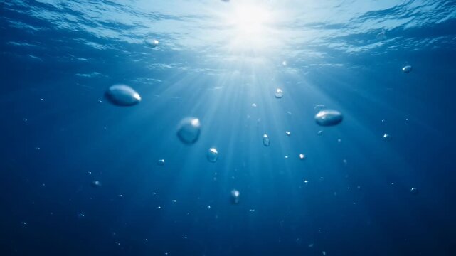 Underwater scene with sun rays shining.