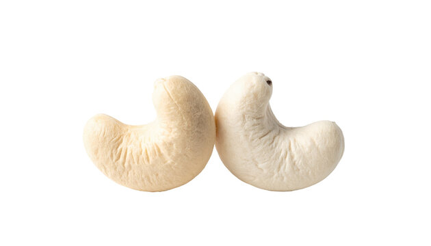Two pale, creamy, kidney-shaped cashew nuts rest close together on a black background, showcasing their textures and contours