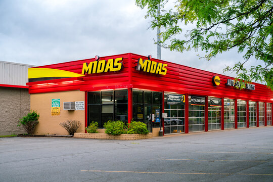 Rome, NY - Jun 7, 2026: Exterior of the Midas Auto Service Experts facility, part of Midas International LLC under TBC Corporation, a global automotive service brand
