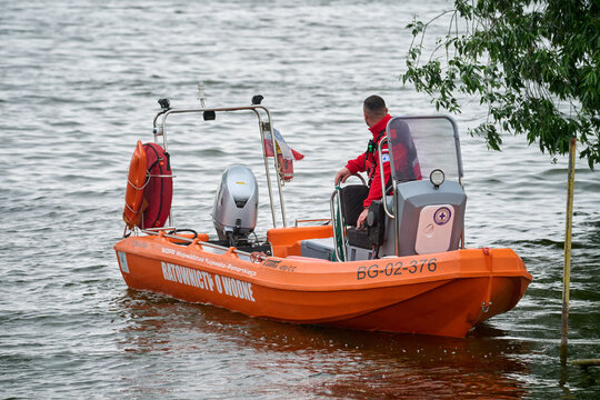 A WOPR water rescue boat with an operator, Znin, Kujawsko-Pomorskie, Poland, Europe.