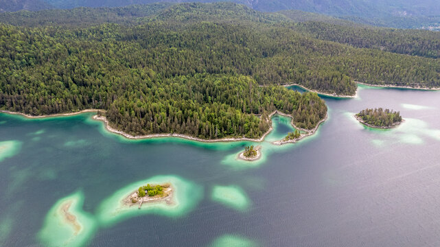 Aerial view over Eibsee and next to Zugspitze on a rainy day, Germany
