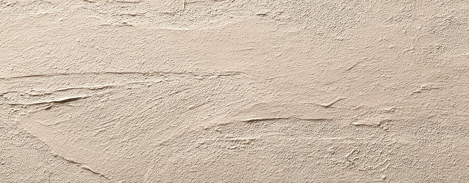 A close-up, textured, neutral-toned surface with rough, organic, layered strokes