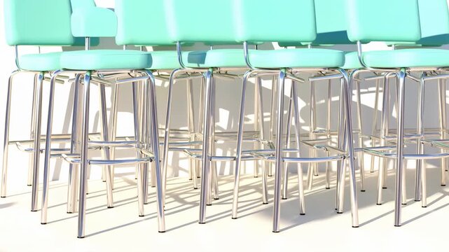 Rows of teal upholstered chairs in empty room