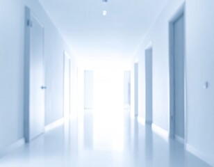 Fototapeta premium Long, blurred hallway with doors in cool, monochromatic tones, leading towards bright light