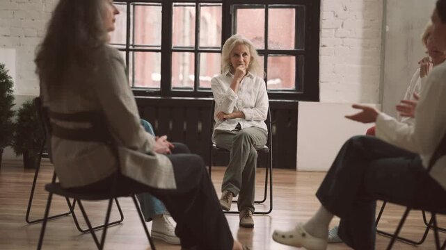 Different women meeting in psychological center for supporting and communication. Talks with professional psychologist for save mental health and recovery after shock and disease, women community