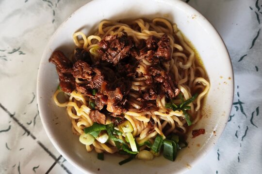 a bowl of Indonesian-style chicken noodles (mie ayam).