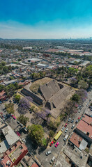 Obraz premium Aerial view over Tenayuca Archaeological Site, Mexico. Pyramid in the middle of the city