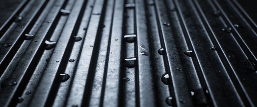 CloseUp Metallic Surface With Rivets Reflecting Light Textures