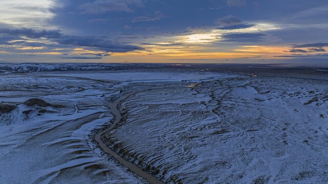 Overgrown river landscape, onset of winter, sunset, Fjallabak Nature Reserve, drone shot, Sudurland, Iceland