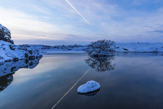 Snow-covered with bushes small island in Lake Myvatn, at blue hour, Kalfastr&ouml;nd, Northern Iceland Eyestra, Iceland