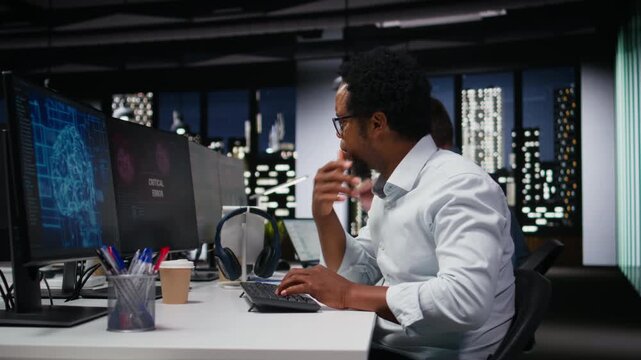 Panicked admin at office desk thinking how to fix critical error alert displayed on PC screen. Tech startup software developer struggling to fix computer bug affecting server network.