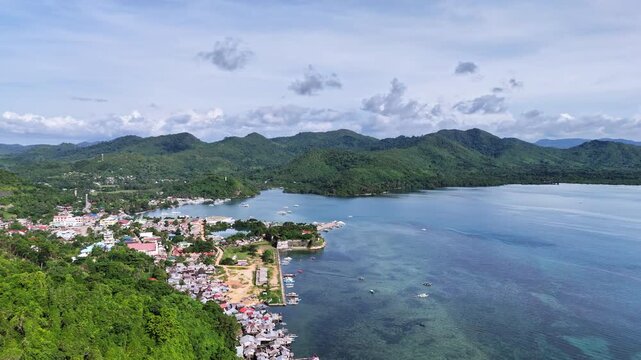 Aerial drone view of Fort Santa Isabel reveals the coral-stone Spanish fortress along Taytays tranquil coast, Philippines