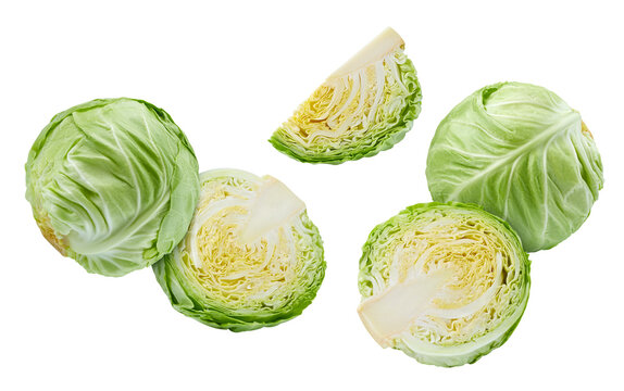 Falling young cabbage isolated on white