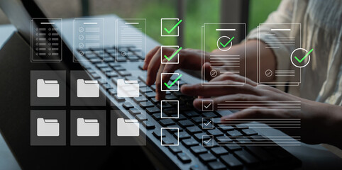Fototapeta premium Close-up of hands typing on a keyboard, surrounded by digital checkmarks and document icons, emphasizing organization and productivity in a modern workspace setting. Cyphers