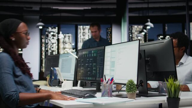 Programmer frustrated with broken keyboard while typing code on computer, developing machine learning models in workspace with coding and programming workflow.