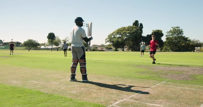 Male batter blocking following bowler delivering, walking off to let teammate bat