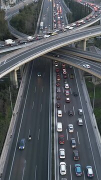 Vertical Aerial View of Highway Interchange and Traffic at Dusk