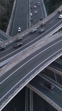 Vertical Aerial View of Highway Interchange and Traffic at Dusk