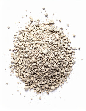 Pile of perlite isolated on white background, natural volcanic mineral material, lightweight porous texture, gardening and horticulture substrate concept. Close-up.