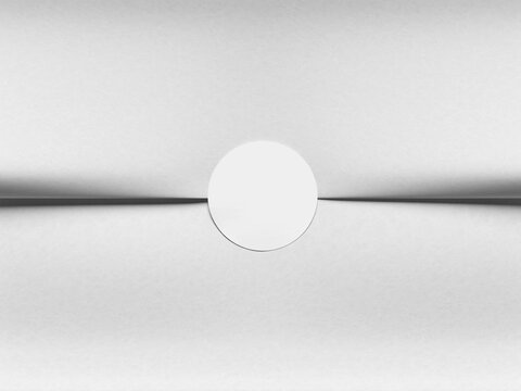 Modern Top View Blank White Round Sticker Mockup on Wrapping Tissue Paper 3D Render