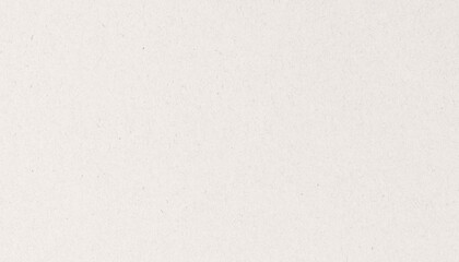 Fototapeta premium Close-up of a textured, off-white paper surface with subtle speckles.