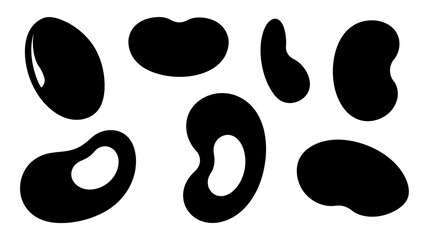 Fototapeta premium A set of black kidney bean shapes on a white background for design or illustration