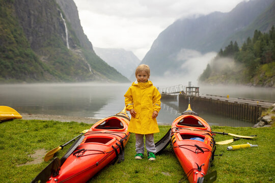 People, children enjoying the amazing views in Norway to fjords, mountains and other beautiful nature